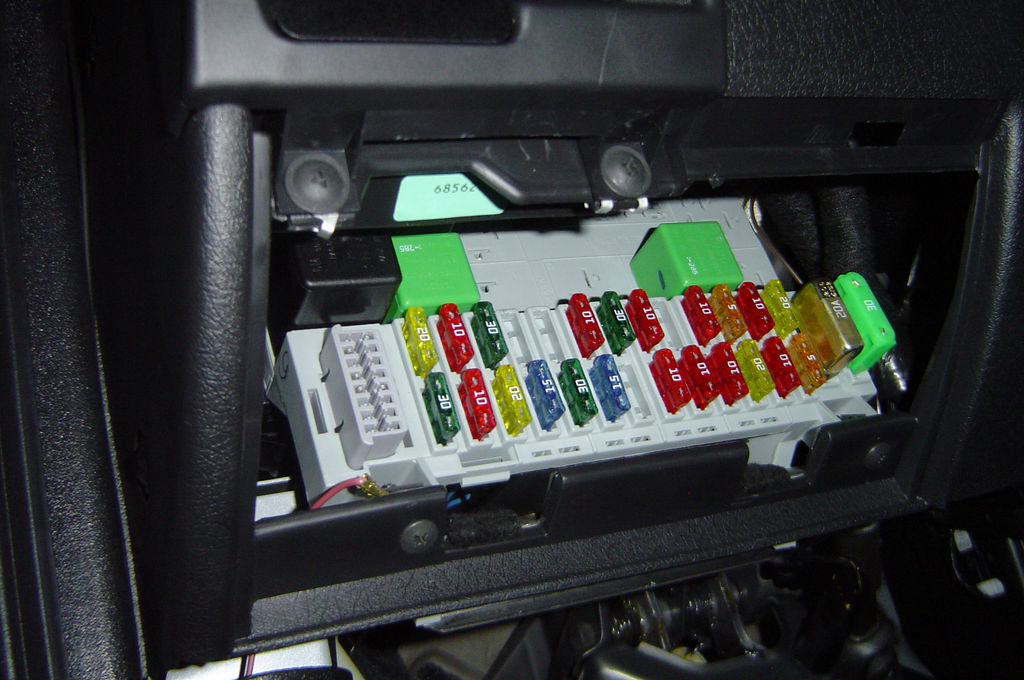 A fuse box. Image courtesy of Henrique Pinto on Flickr, hosted under CC BY 2.0.